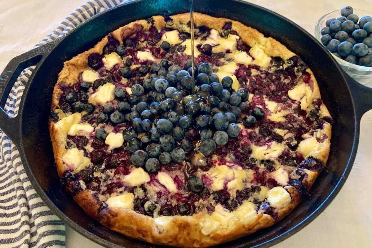 Blueberry Cheesecake German Pancakes in a pan.