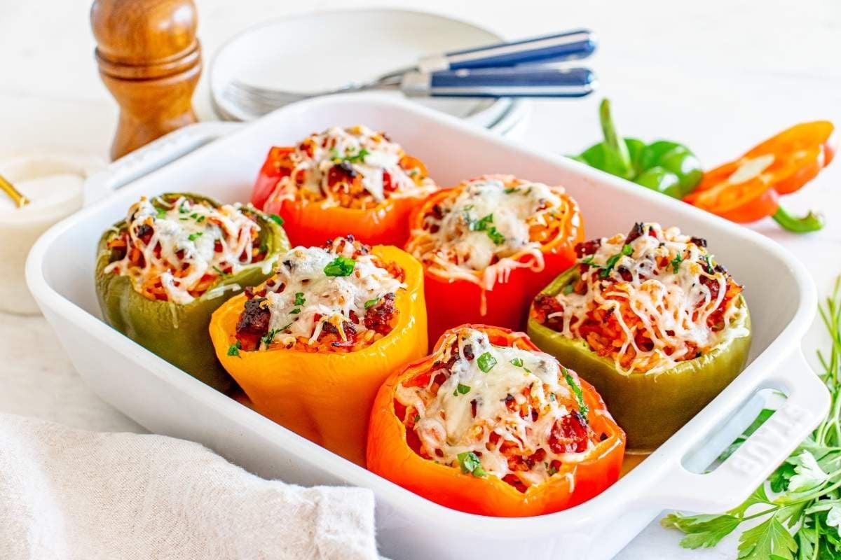 21 Meals That People Think Are Easy Until They Try Doing Them Right 17 Italian Stuffed Peppers in a baking dish.