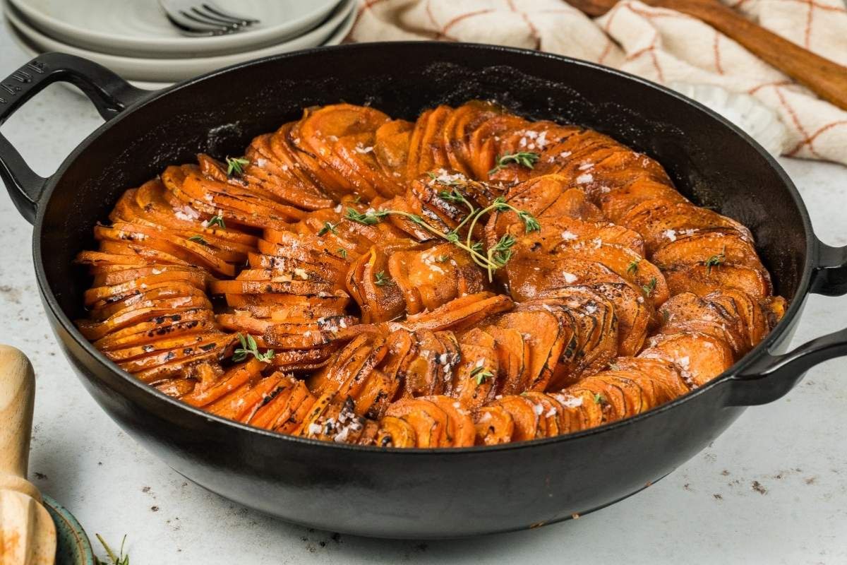 Orange Glazed Sweet Potatoes in a pan.
