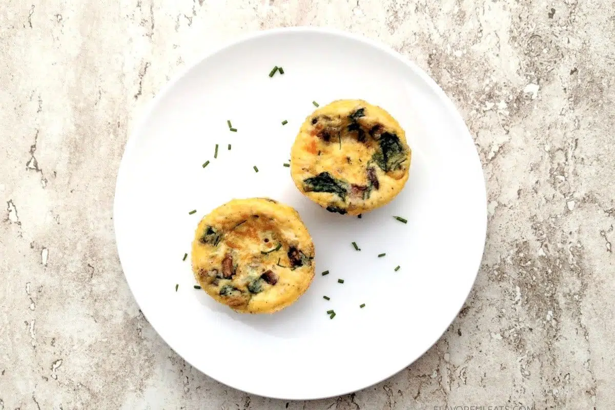 Spinach and Mushroom Muffin Pan Omelets served on a plate.