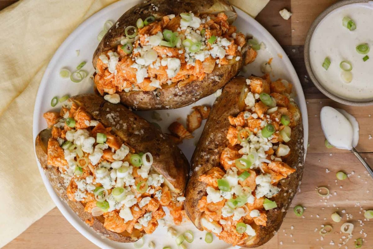 Buffalo Chicken Baked Potatoes on a plate.