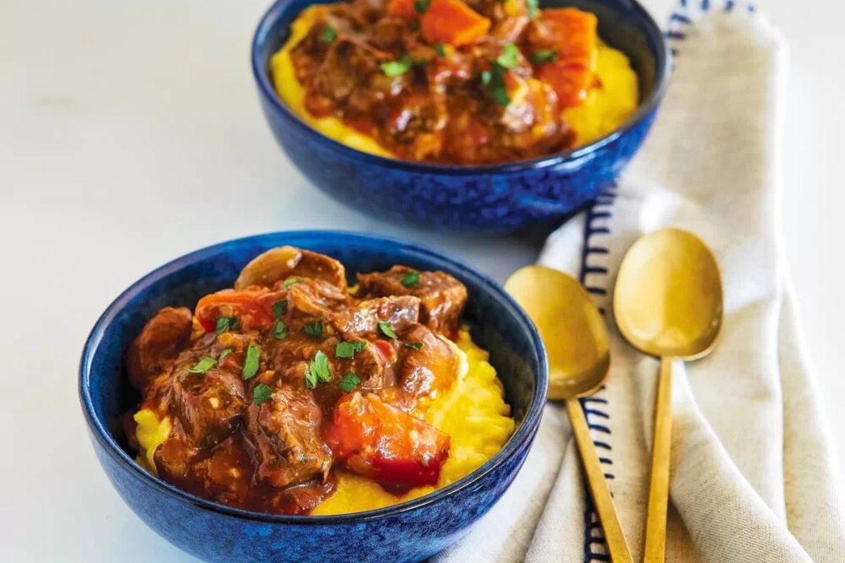 Bowls of Slow Cooker Beef Stew with Cheesy Polenta.