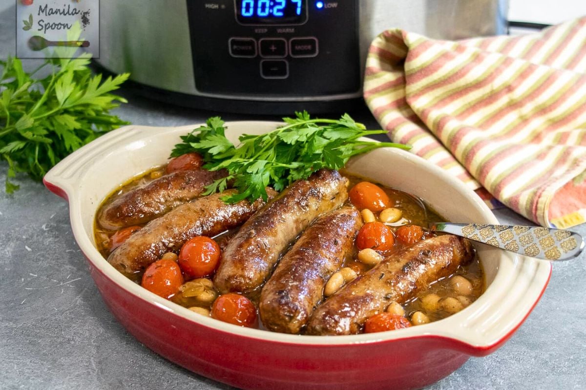 Slow Cooker Sausage and White Bean Cassoulet with cilantro.